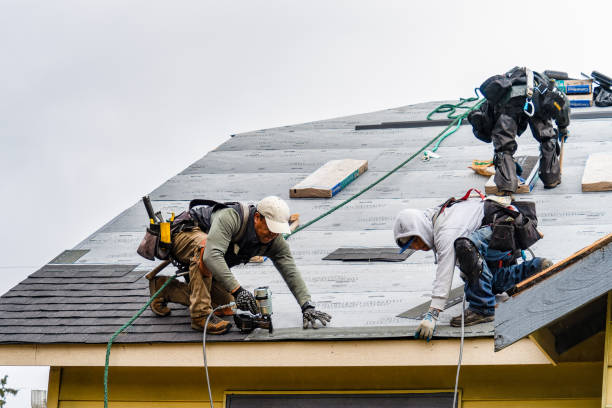 Professional Roof Replacement technician working in Riverside, CA